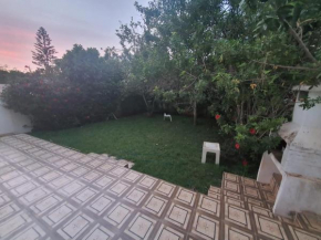Saidia - Villa avec jardin, en bord de mer, dans une résidence fermée.